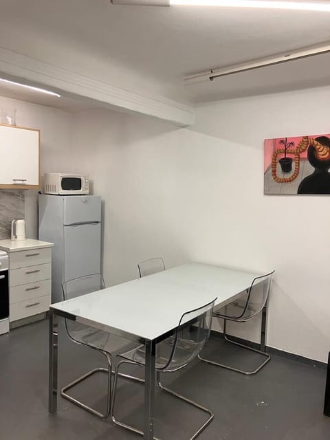 EP9B - Dining area and kitchen in the background