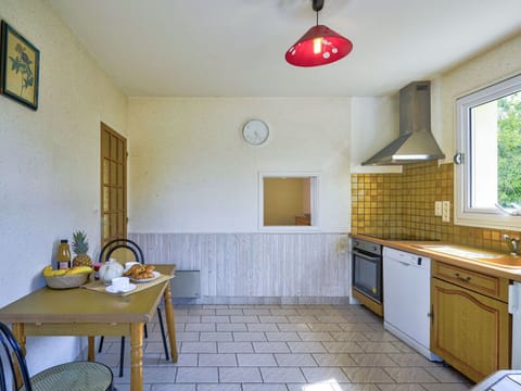 Cabinetry, Property, Countertop, Window, Lighting, Table, Interior Design, Yellow, Sink, Floor