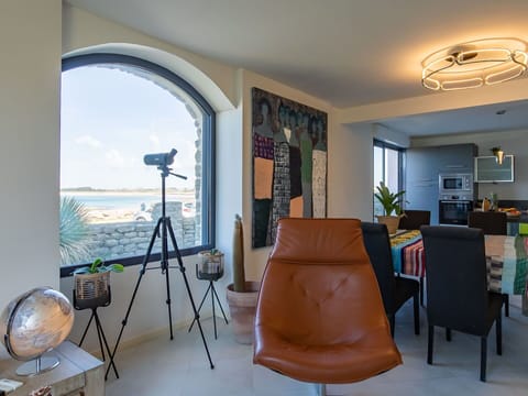 Furniture, Property, Building, Plant, Azure, Table, Houseplant, Comfort, Chair, Lighting