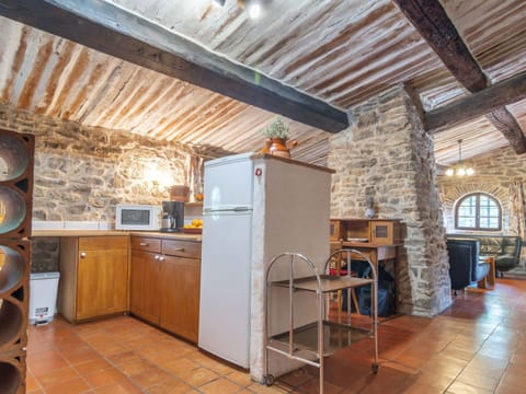 Building, Cabinetry, Wood, Lighting, Kitchen Appliance, Refrigerator, Kitchen, Countertop, Beam, Floor