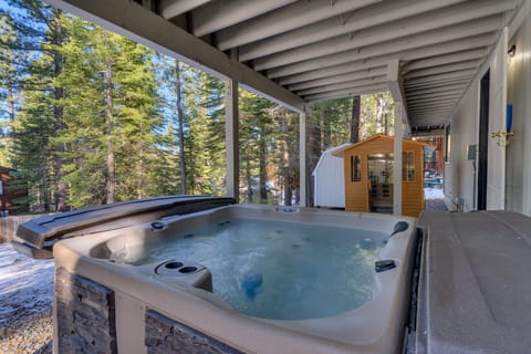 - Private hot tub retreat with forest views  
- Covered deck plus outdoor sauna for relaxation  
- Perfect Tahoe cabin stay with year-round comfort