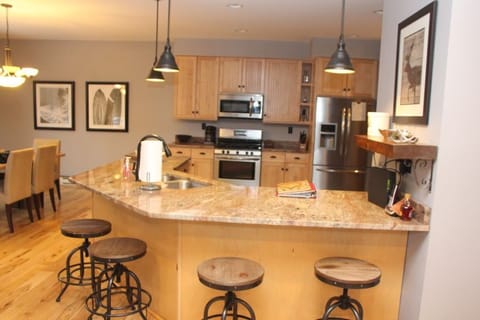 A full kitchen with all of necessary items for preparing a gourmet meal