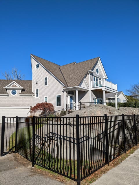 Side of house with fenced yard