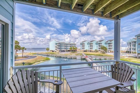 Enjoy your morning coffee on the balcony overlooking both the association pond and the bay