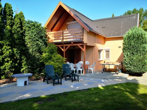 Plant, Property, Sky, Furniture, Tree, Shade, Architecture, Land Lot, Cottage, Grass
