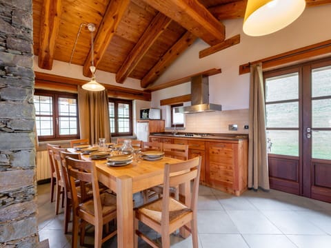 Table, Furniture, Window, Chair, Wood, Lighting, Interior Design, Cabinetry, Wood Stain, Beam