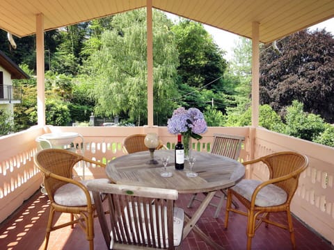 Table, Furniture, Property, Flower, Plant, Chair, Outdoor Table, Interior Design, Outdoor Furniture, Wood