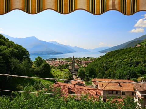 Sky, Plant, Property, Light, Mountain, Natural Landscape, Water, Leaf, Nature, Green