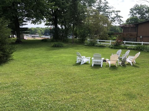 Park-like yard with plenty of privacy and room for yard games and a bonfire.