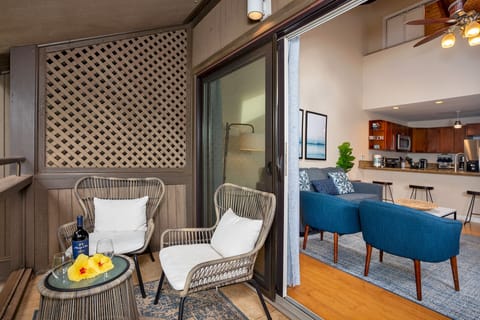 Take a relaxing break on our lanai with garden oasis views.