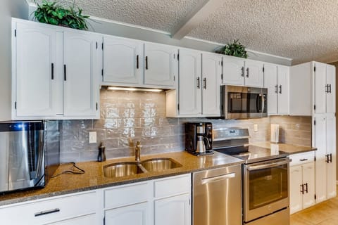 Kitchen w wine fridge and ninja coffee bar