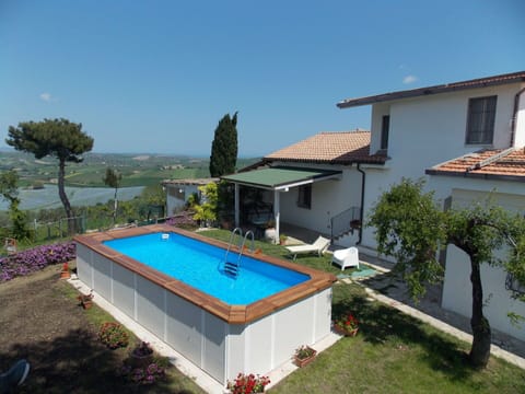 Plant, Building, Property, Water, Sky, Swimming Pool, Window, Azure, Tree, House