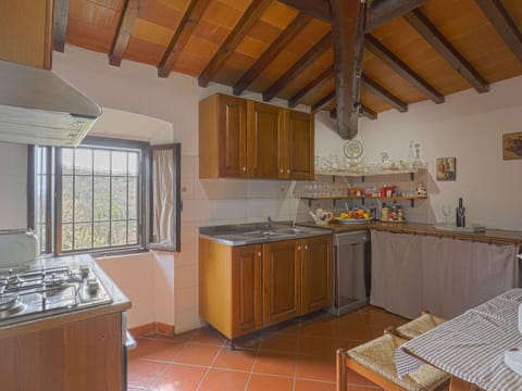 Countertop, Cabinetry, Property, Furniture, Window, Building, Kitchen, Kitchen Stove, Sink, Kitchen Appliance