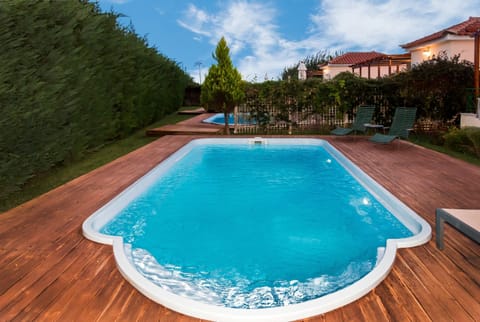 A splash of serenity in your backyard: Where relaxation meets the crystal-clear embrace of your private pool