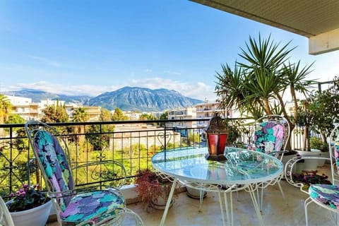 View from the Balcony – Enjoy panoramic views of the city and mountains from your private balcony.