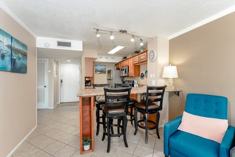 Our practical island getaway is perfect for a couple or a small family. Our kitchenette seats 4!