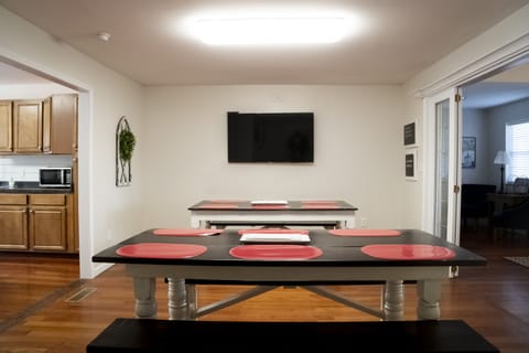 One of two dining and/or meeting rooms with smart TV for meetings or fun!