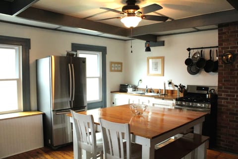 Our cozy kitchen with custom table to fit the whole family!