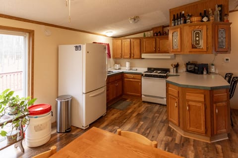 Kitchen with fridge/freezer, coffee maker, toaster.  We do recycle.