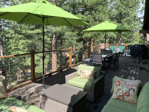 Outdoor dining and lounging on the expansive upper deck