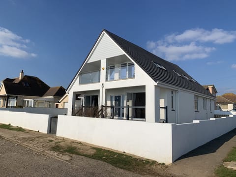   The house sits in a large detached plot.