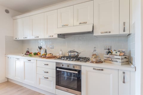 Dishwasher, oven, stove top and refrigerator (next foto) are all new.