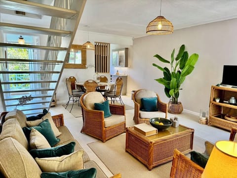 Air-conditioned living/dining room in a 3-bedroom refurbished duplex apartment
