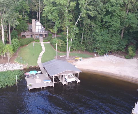 Aerial view of house with beach 