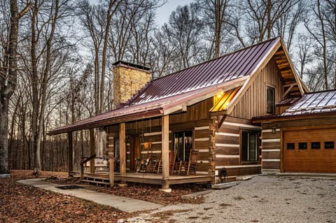 Secluded hilltop cabin surrounded by peaceful forest views