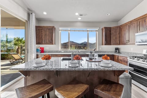 Kitchen island with 3 stools.