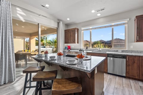 View of kitchen toward patio and Lazy River.