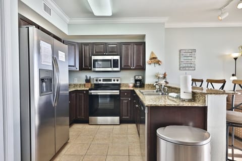 Upgraded High End Kitchen Cabinets Not Standard in Tidewater Condos All Stainless Appliances and Fully Stocked for Vacation Rental Cooking