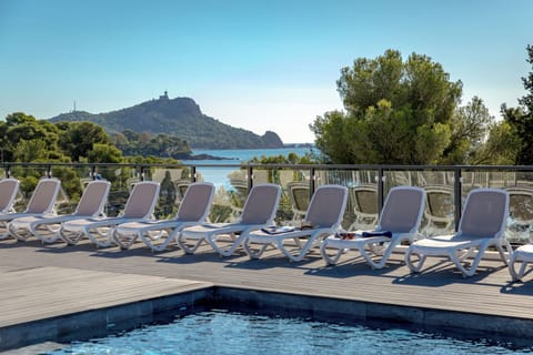 Take in gorgeous views while lounging around the on-site outdoor pool.