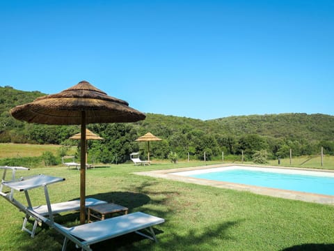 Water, Sky, Plant, Azure, Swimming Pool, Shade, Outdoor Furniture, Land Lot, Tree, Natural Landscape