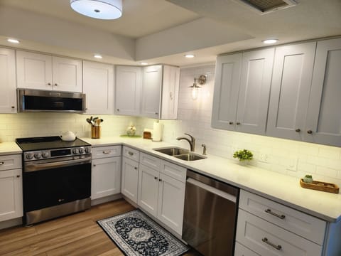 All New!
Custom Kitchen with Quartz countertops and a super quiet dishwasher.