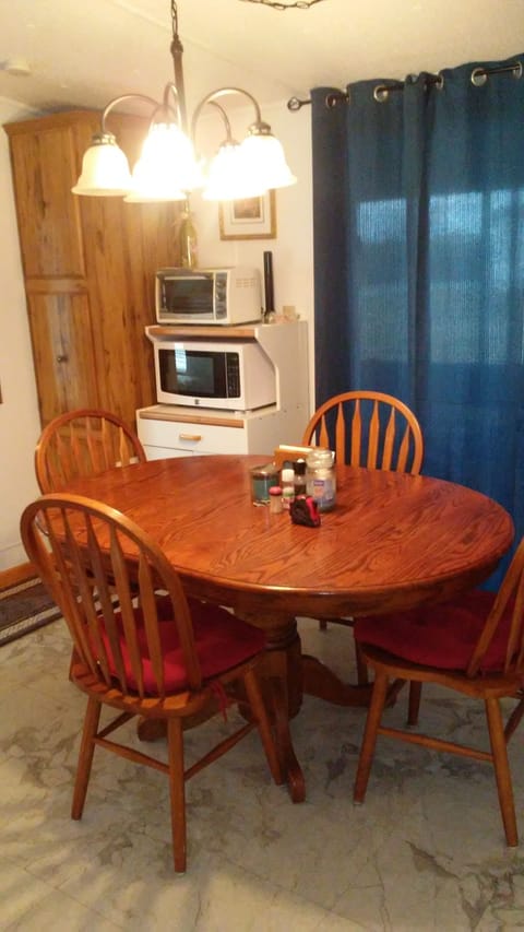 Seats 4 plus microwave and toaster oven.