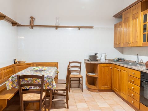 Cabinetry, Property, Furniture, Countertop, Kitchen Sink, Kitchen Appliance, Sink, Lighting, Interior Design, Wood