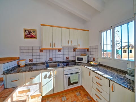 Cabinetry, Countertop, Sink, Furniture, Drawer, Kitchen, Tap, Kitchen Stove, Wood, Window