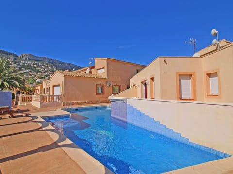 Water, Building, Sky, Property, Plant, Blue, Swimming Pool, Shade, Architecture, House