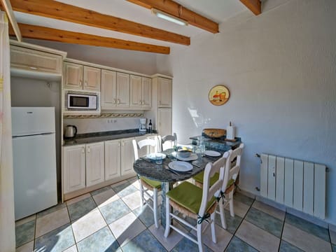 Furniture, Cabinetry, Table, Countertop, Chair, Wood, Kitchen, Interior Design, Drawer, Kitchen Stove