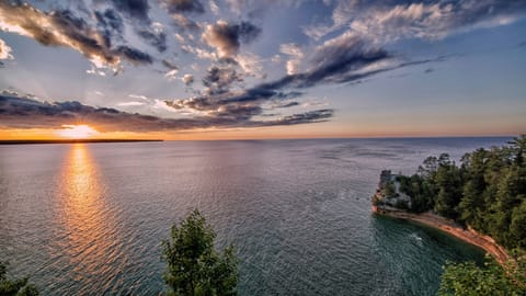 Scenic sunset view over calm waters near the property.