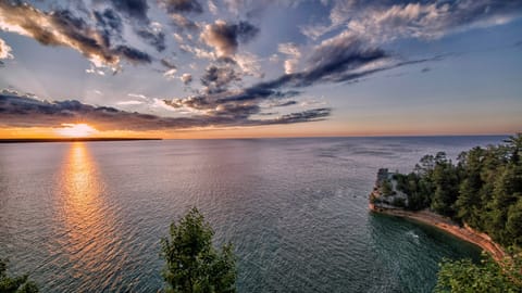 Scenic sunset view over calm waters near the property.