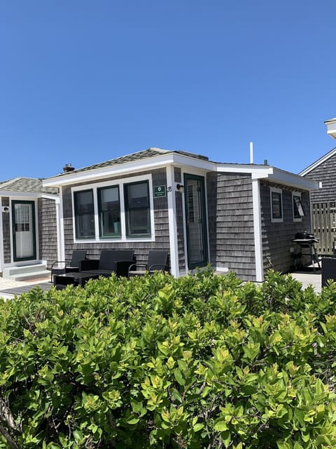 Cottage with front, side & rear private decks.
