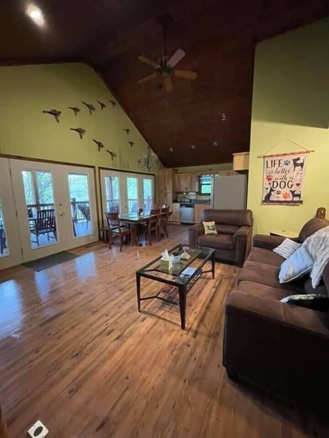 Upper level living room and kitchen area.