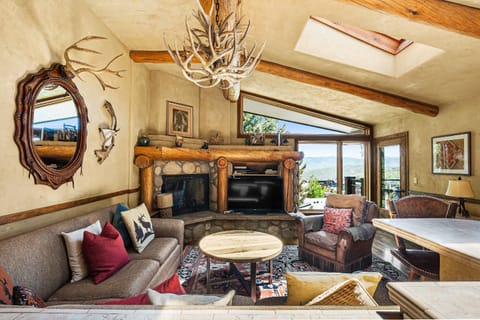 High ceilings with skylights makes this 3rd floor living space bright and inviting year round.