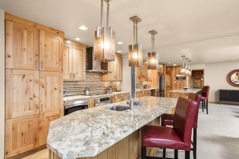 The fully equipped kitchen makes preparing a light snack or full gourmet meal a breeze.