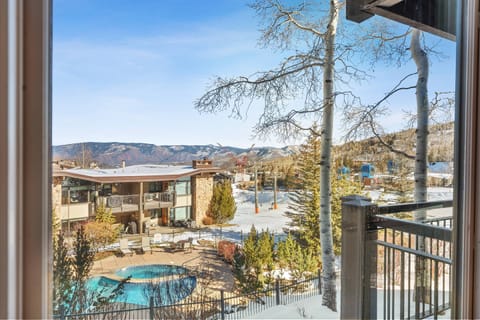 This unit looks out to the heated pool and hot tub