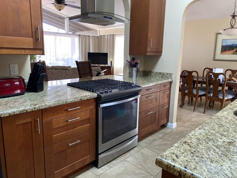 Kitchen with eat- entering while you cook