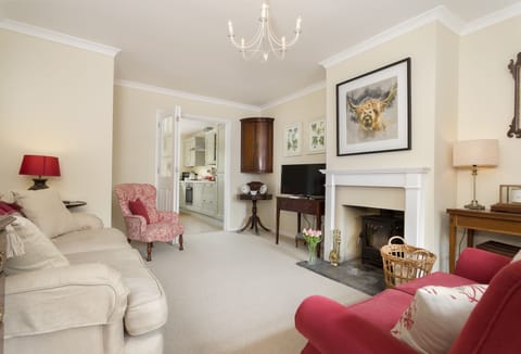 Ground floor: Cosy sitting room with wood burning stove