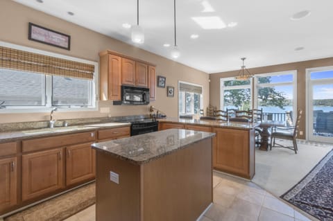Kitchen with lake views and breakfast bar